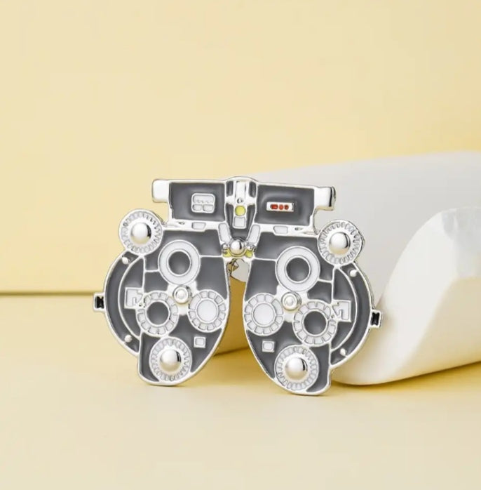 Pin optometría foroptor
